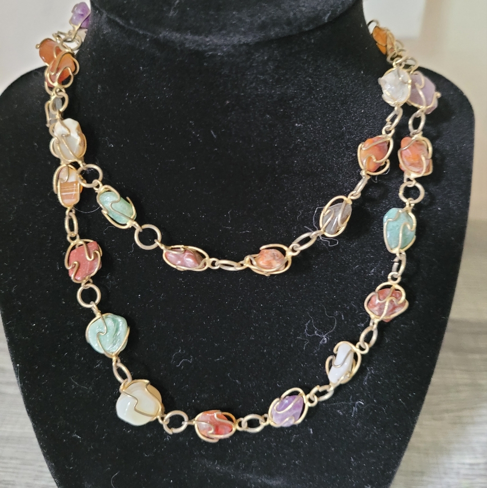 Gold tone chain with gem rocks